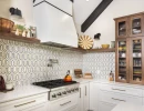 custom kitchen design feature open shelves and unique patterned backsplash