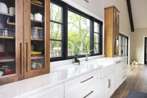 kitchen countertops with custom cabinetry and large window views