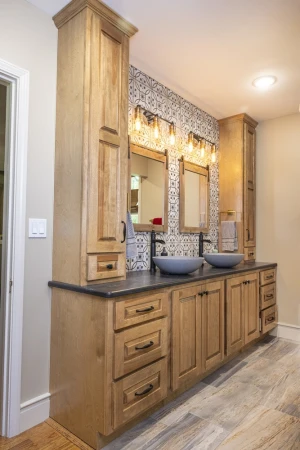 bathroom vanity with double vessel sinks and custom backsplash