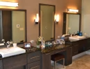 large master bathroom with double sinks and vanity