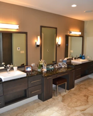 large master bathroom with double sinks and vanity