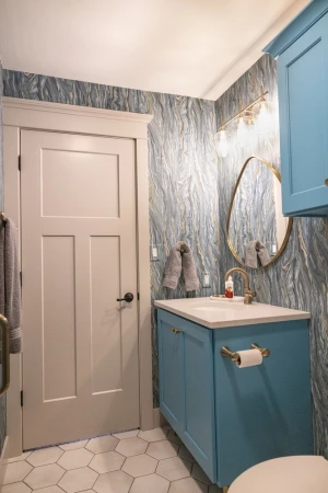 bathroom remodel with ornate wallpaper application