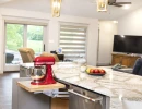 kitchen island with built in hidden KitchenAid mixer platform