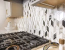 six range stove with beautiful backsplash