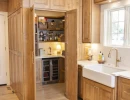 hidden kitchen pantry with wine fridge