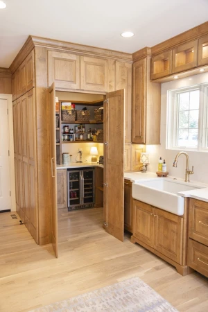 hidden kitchen pantry with wine fridge