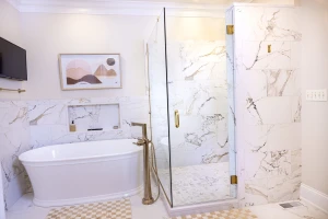 soaker tub and shower remodel with tv and built-in storage