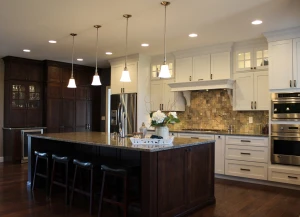 kitchen renovation with custom oven hood and cabinets