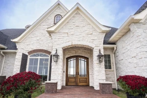 entrance of custom home construction with interior design