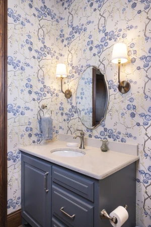 guest bath renovation with complementary wallpaper