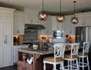 kitchen renovation project with custom backsplash and premium lighting