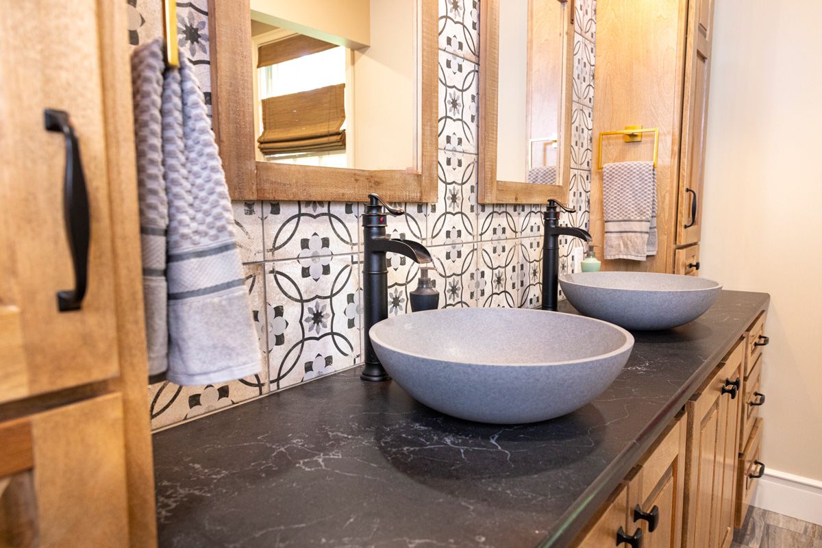 custom sinks and vanity with ornate backsplash